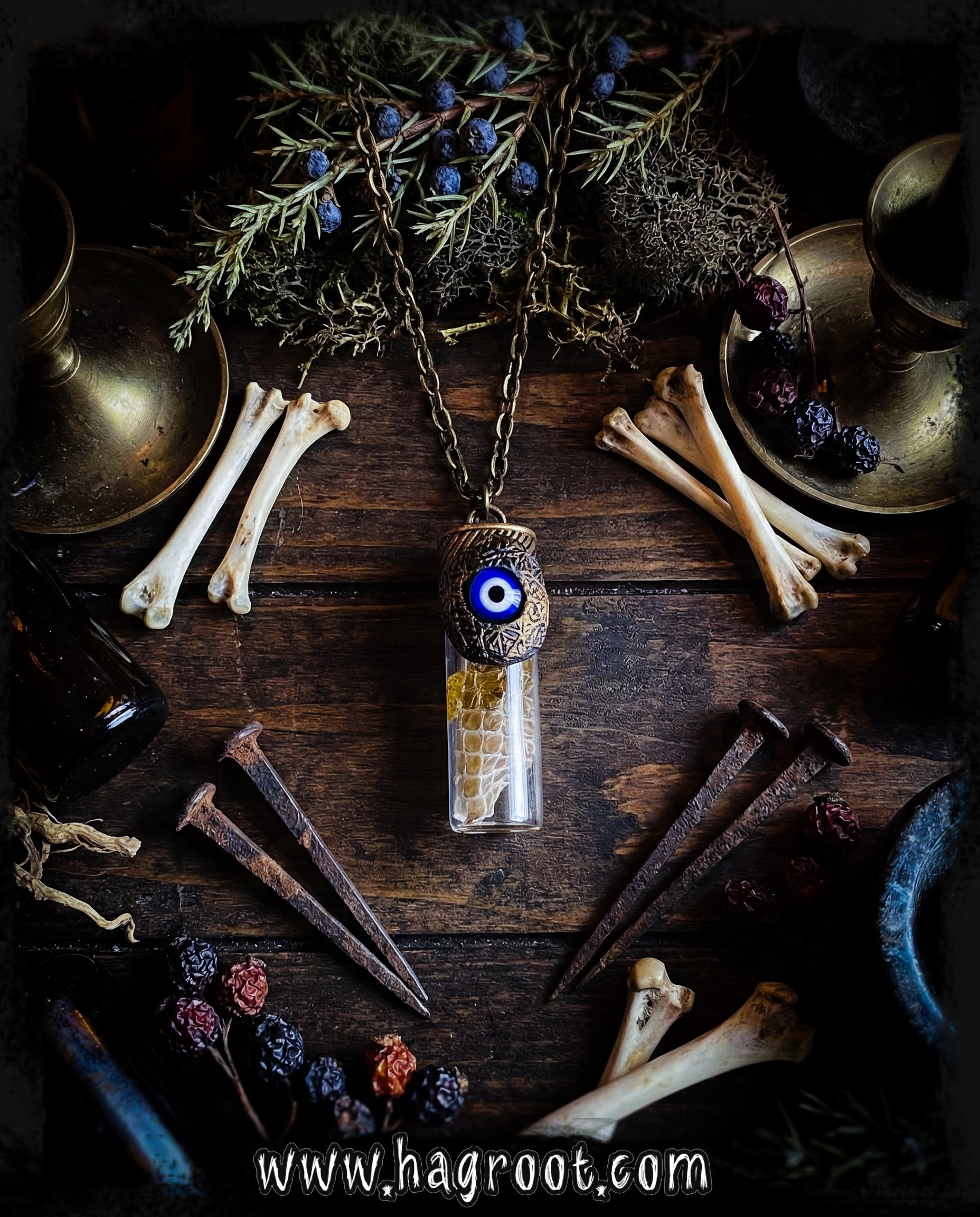 Conjure Necklace with Snake Skin, Copal, an Evil Eye and an Organic Clay Pattern