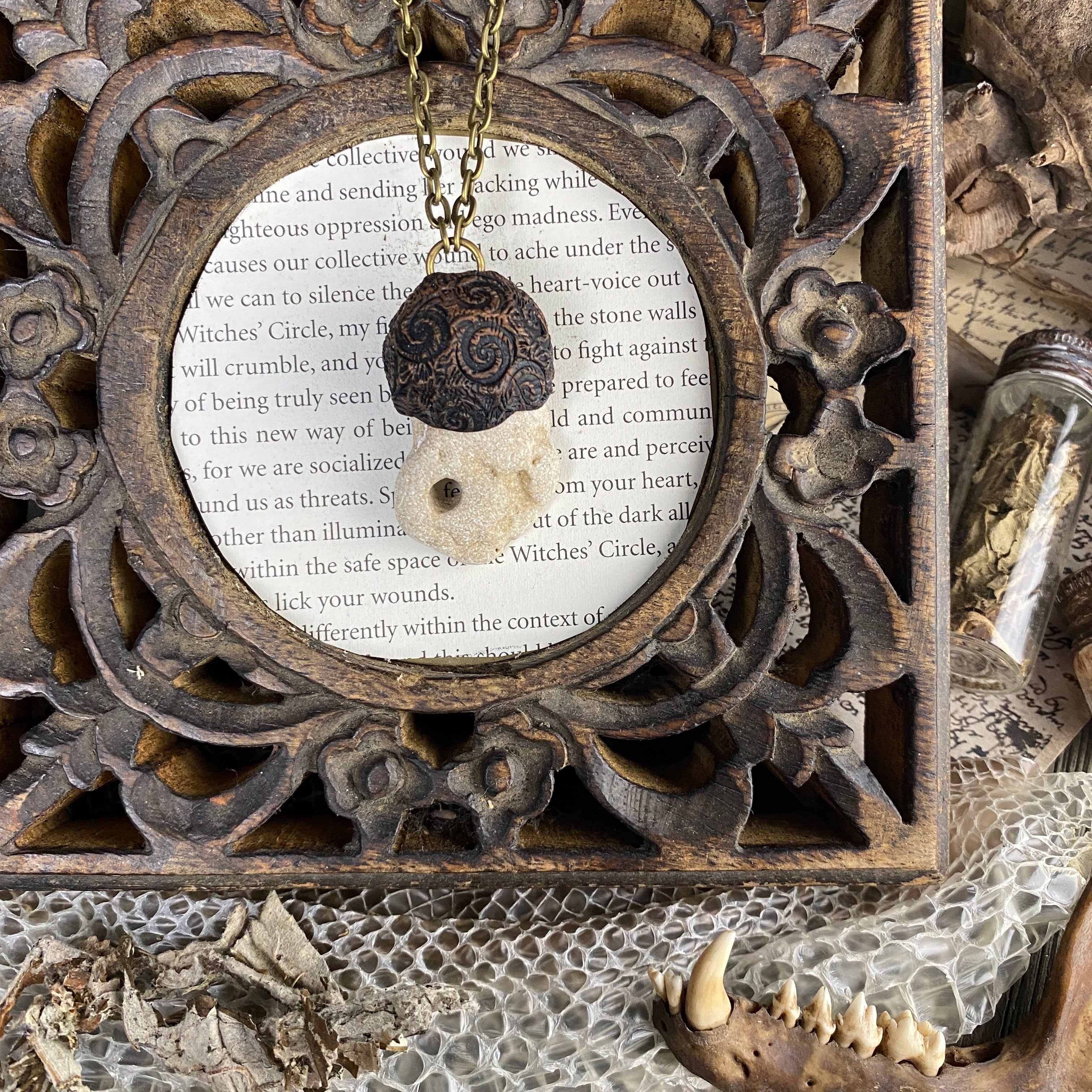 Hag Stone Talisman Necklace with a Spiral Pattern