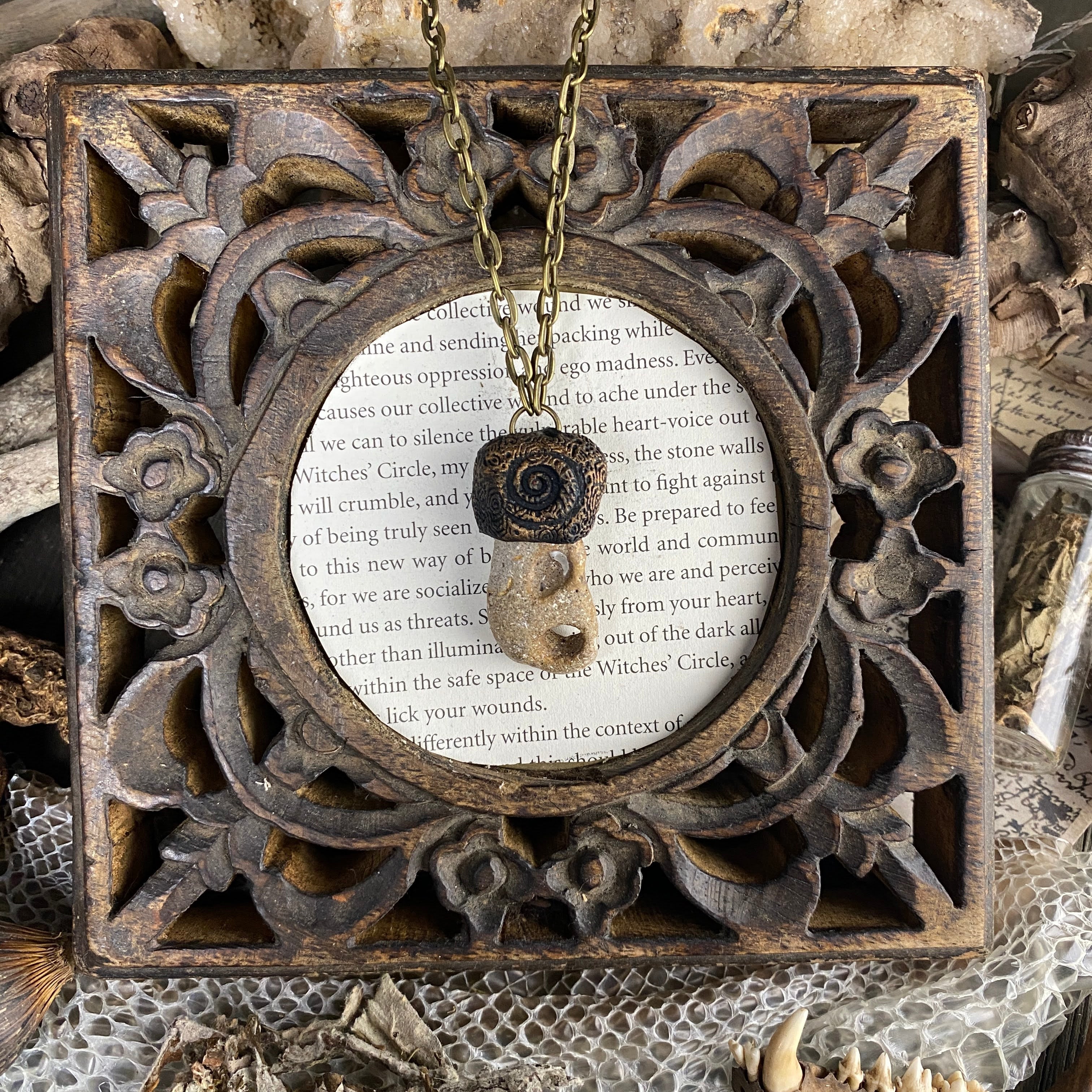 Hag Stone Talisman Necklace with a Spiral Pattern
