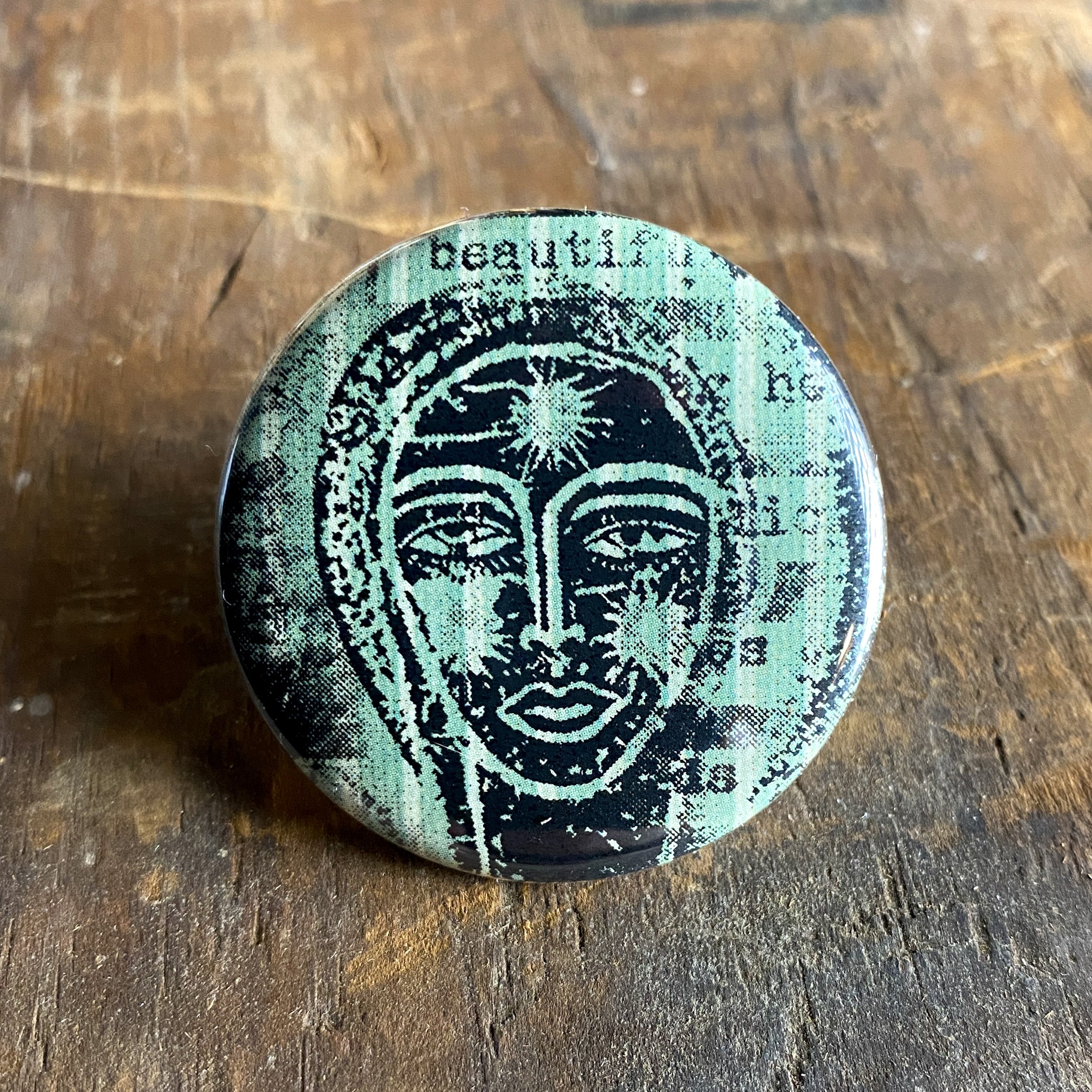 Stamped Face - Hand Pressed Button/Pin - 1.5"