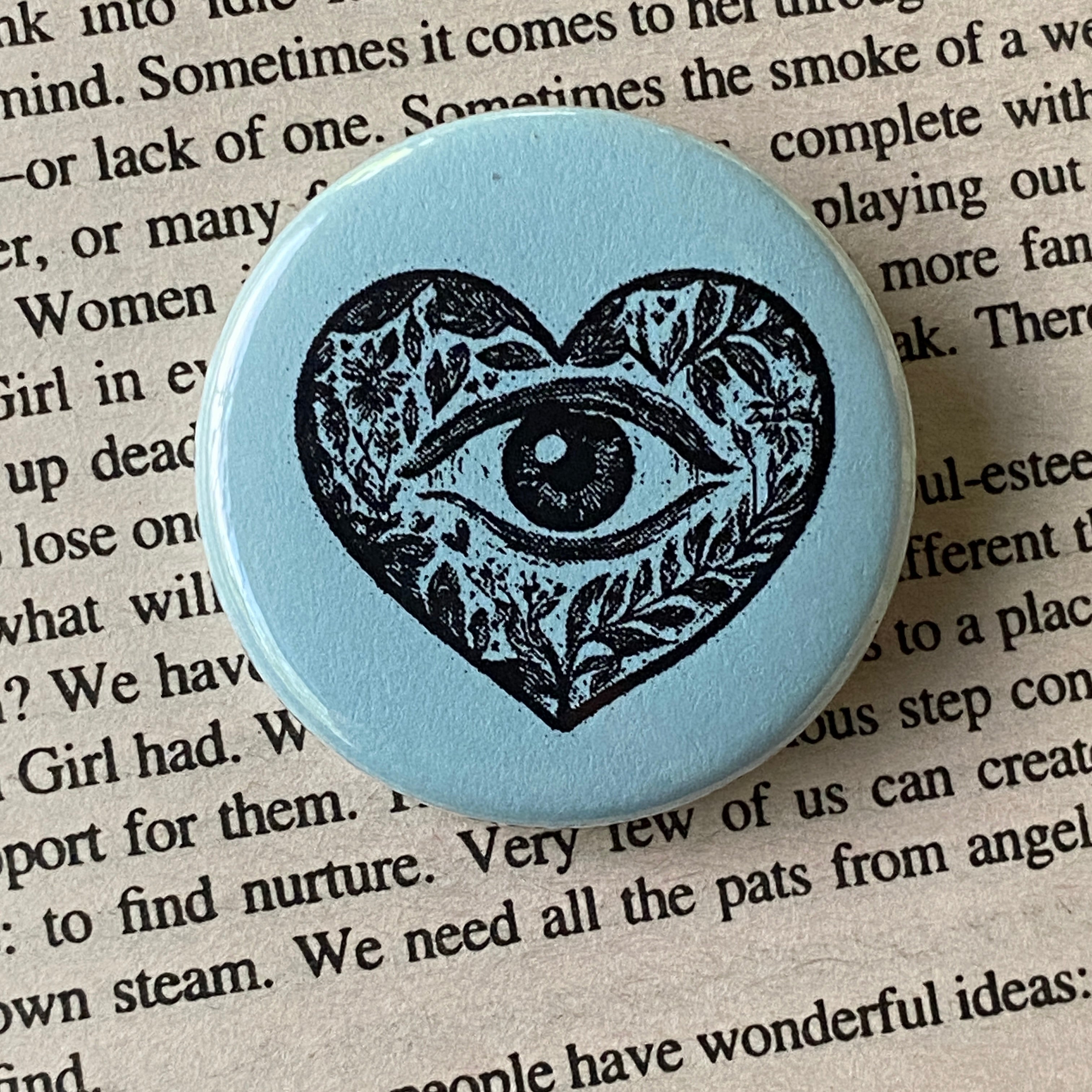 The Heart Sees - Hand Pressed Button/Pin - 1.5"