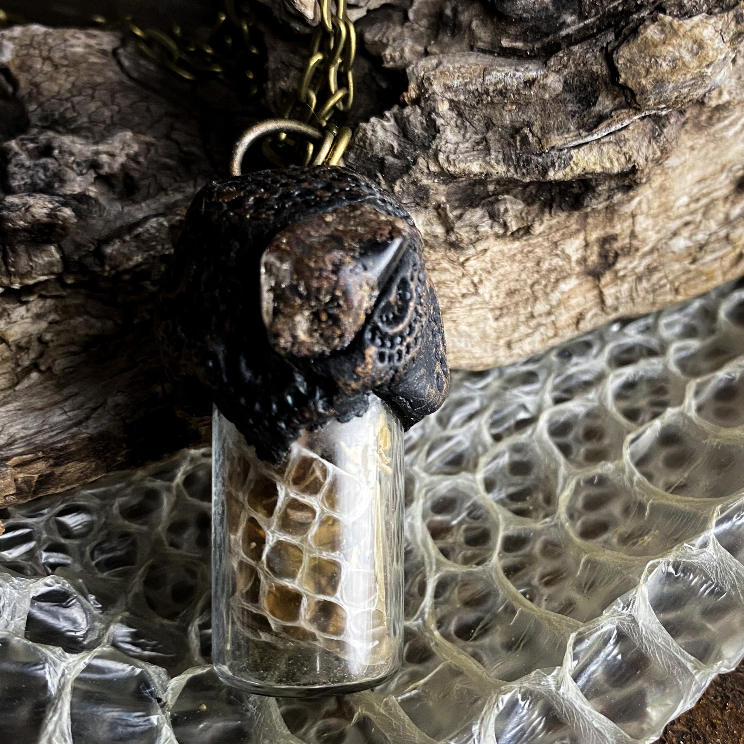 Conjure Necklace with Snake Skin, Ghost Quartz and Motherwort